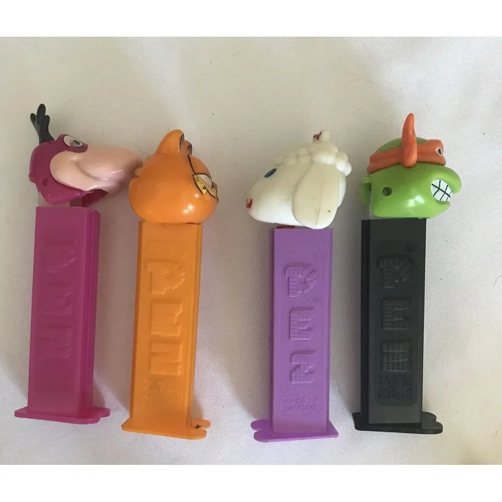 PEZ Dispensers Lot of 21 PEANUTS, DISNEY GARFIELD, SANTAS, LAMB AND‎ MORE